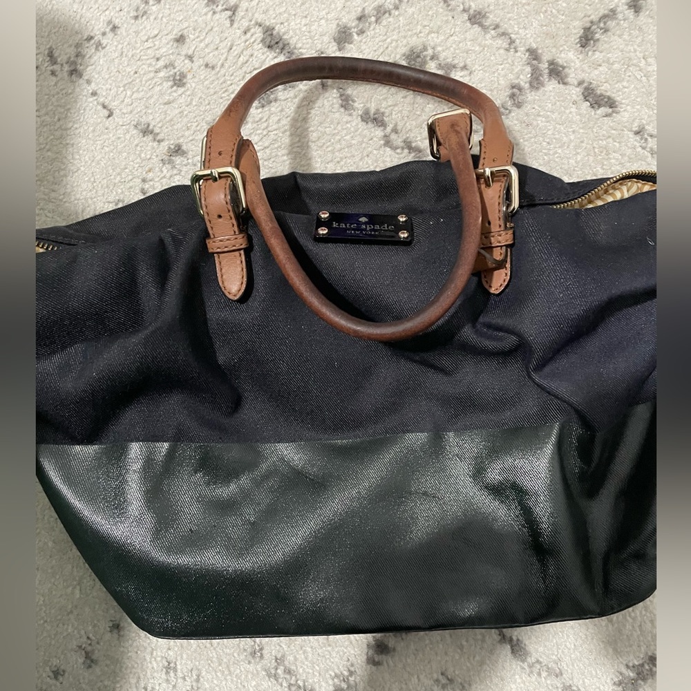 Kate Spade pocketbook.  Very spacious and in good condition.